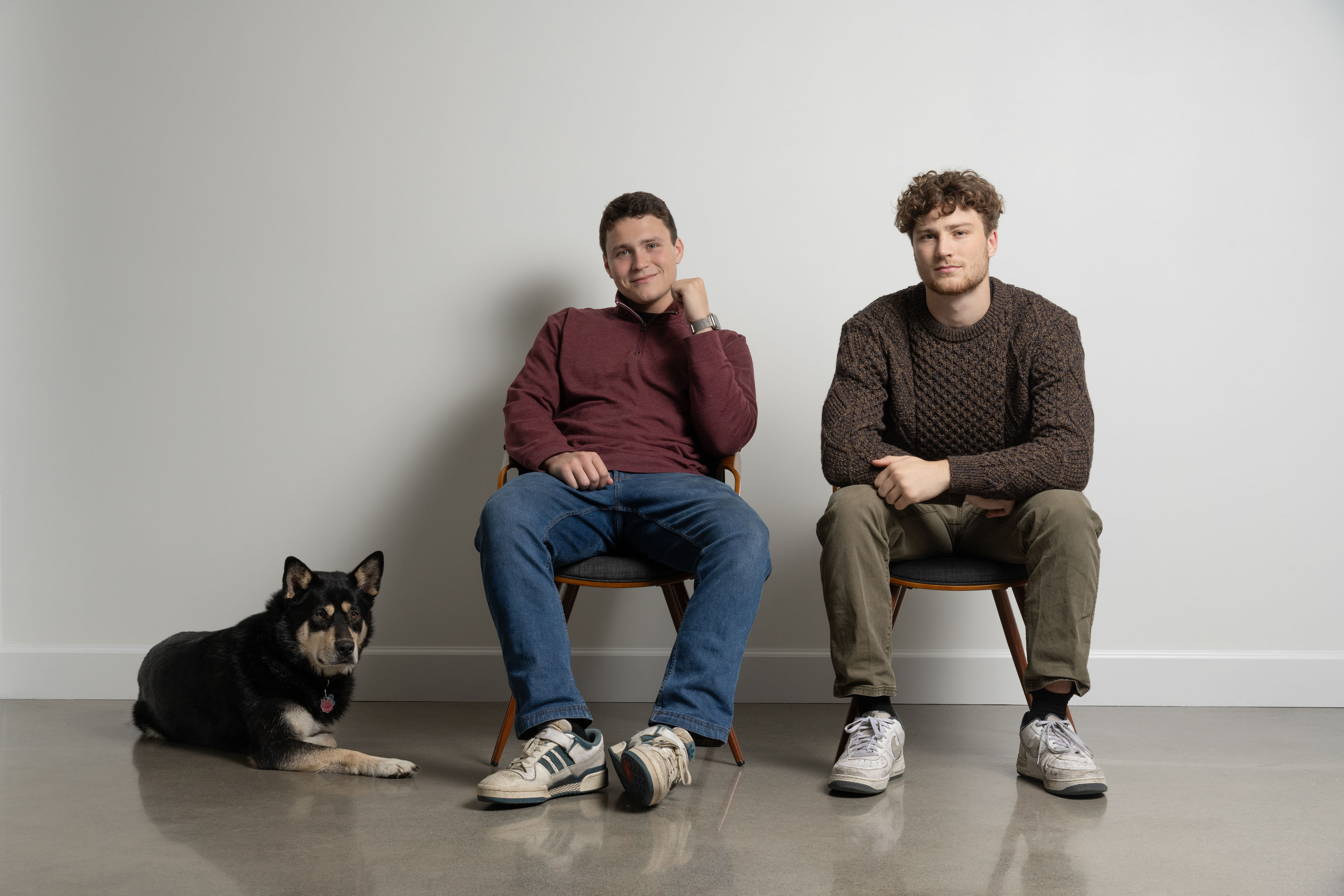Colin and Niko with Koba the dog, co-owners of Minuteman Press North Seattle